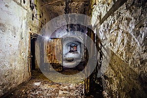 Dark and creepy corridor of old abandoned forgotten Soviet underground bomb shelter