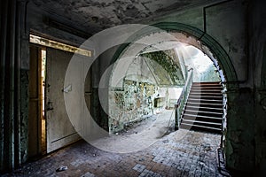 Dark and creepy corridor of old abandoned mental hospital