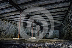 Dark and creepy dirty abandoned underground basement