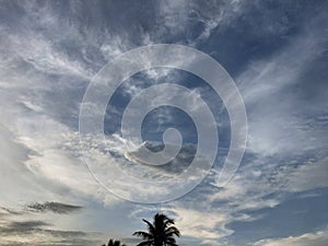 Dark cumulus and cirrus clouds in the sky