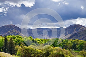 Dark Cumulus clouds over Fleetwith Pike in Spring