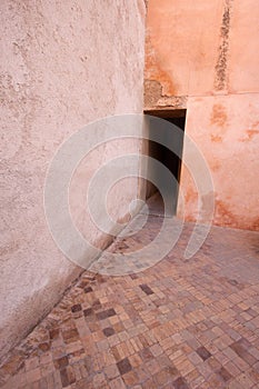 Dark doorway in corner of courtyard