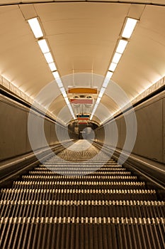 Dark escalator shot from above