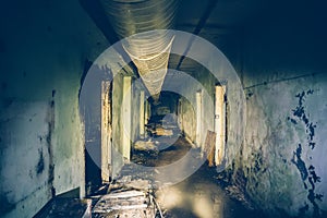 Dark flooded corridor or tunnel in old underground abandoned Soviet military bunker