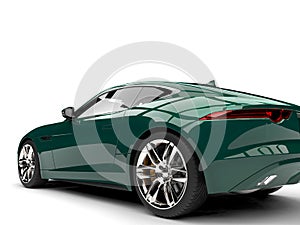 Dark forest green modern concept sports car - rear wheel closeup shot