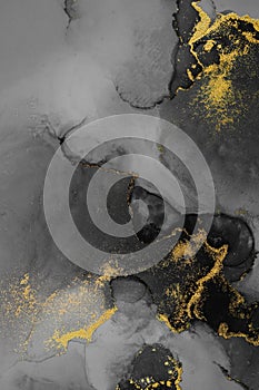 Dark gold abstract background of marble liquid ink art painting on paper .