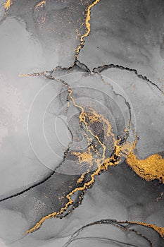 Dark gold abstract background of marble liquid ink art painting on paper .
