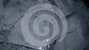 Dark gray broken ice background