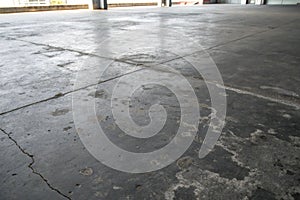 Dark gray concrete surface with stains photo