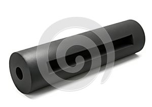 Dark gray cylindrical object with a rectangular slot isolated on white background