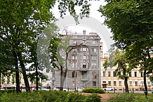 Dark gray eclectic house on Avenue of Rimsky-Korsakov in St. Petersburg