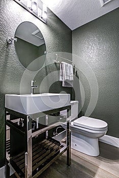 Dark Gray powder room with chrome washstand