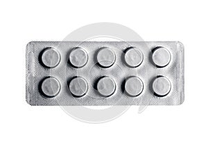 Gray rectangular blister for ten round tablets isolated on white