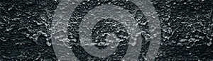 Dark gray roomy wide background of hardened cement mortar drips