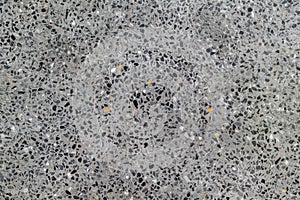 Dark gray sandwash texture background.