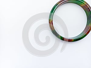 Dark Green Jade Bracelet Isolated On White Background. Upper Corner Position With Negative Space