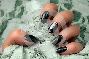 Dark green nails manicure