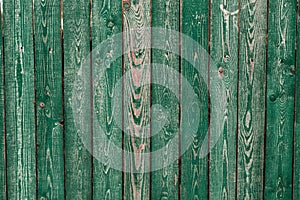 Dark green old wooden boards. Backgrounds and textures fence painted. Front view. Attract a beautiful vintage background