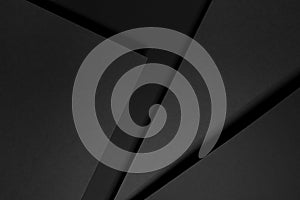 Dark grey abstract geometric background with soar rectangle spaces, stripes, lines, corners in hard light with black shadows.