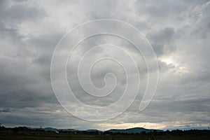 Dark and grey featureless layers of nimbostratus clouds.