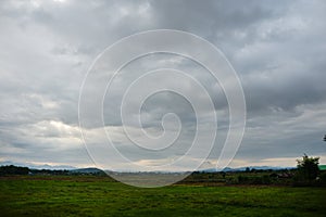 Dark and grey featureless layers of nimbostratus clouds.