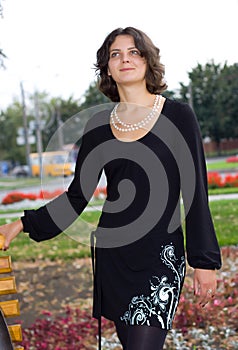 Dark hair girl in black dress