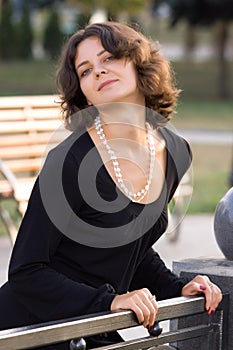 Dark hair girl in black dress