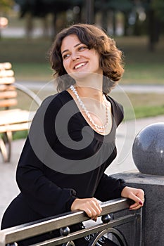 Dark hair girl in black dress