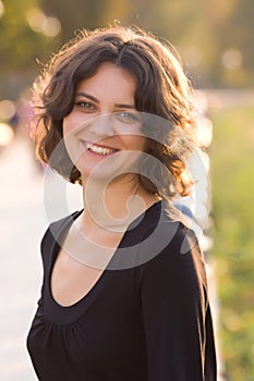 Dark hair girl in black dress