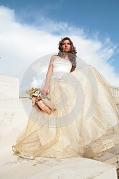 Dark-haired princess in white-golden gown