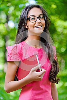 Dark-haired young woman with red