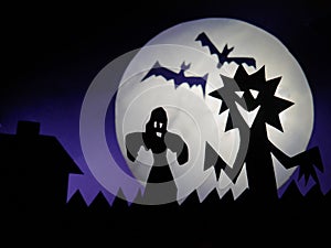 Dark Halloween season background with moon in the background and scary creatures silhouettes.Dark Halloween season background with