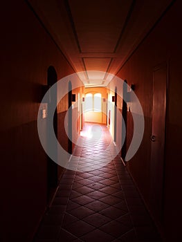 Dark hallway with sunlight