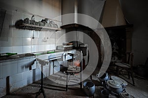 Dark kitchen of an old abandoned house