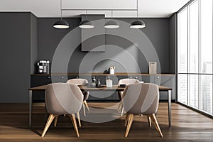 Dark kitchen room interior with dining table, four chairs