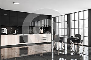 Dark kitchen room interior with table and four chairs