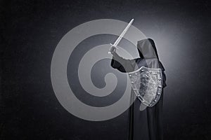 Dark knight with sword and shield