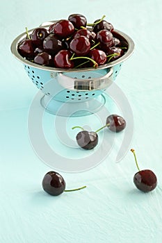 Dark lapin cherries vintage colander