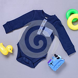 Dark and light blue onsie with toys