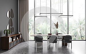 Dark living room interior with table and chairs, sideboard and panoramic window