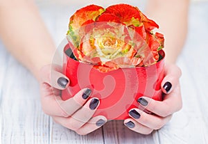 Dark manicure and flowers