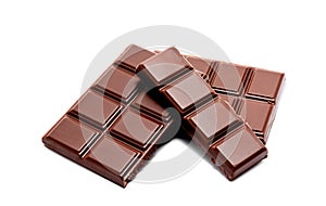 Dark milk chocolate bars stack isolated on a white