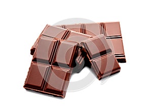 Dark milk chocolate bars stack isolated on a white