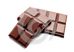 Dark milk chocolate bars stack isolated on a white