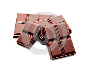Dark milk chocolate bars stack isolated on a white