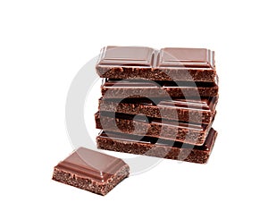 Dark milk chocolate bars stack on a white