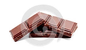 Dark milk chocolate bars stack on a white