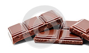 Dark milk chocolate bars stack on a white