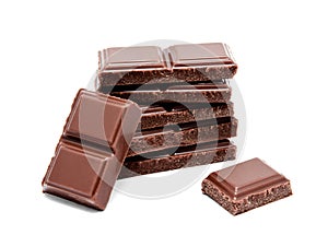 Dark milk chocolate bars stack on a white