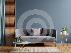 Dark modern interior design mockup with sofa on empty dark blue wall background